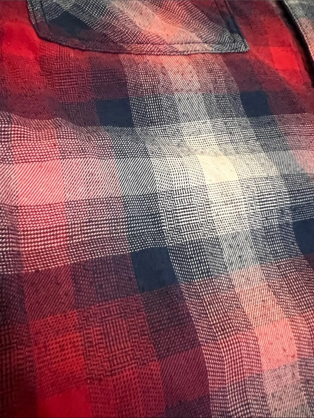 The North Face Black Jacket with Red & Blue Plaid Lining can be worn inside-out